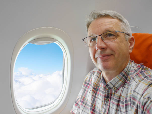 istock Middle aged caucasian man in aircraft cabin 961759184