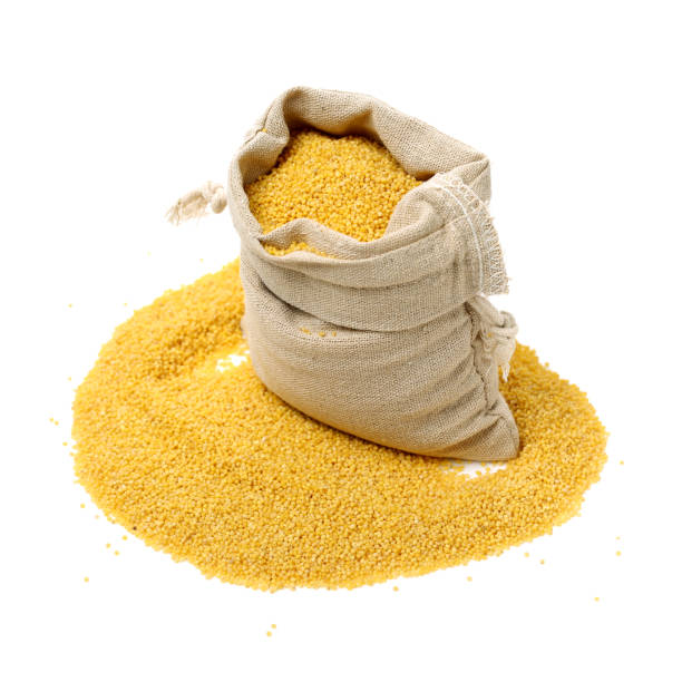 istock Raw uncooked millet  a bag   isolated on white  background 961760146