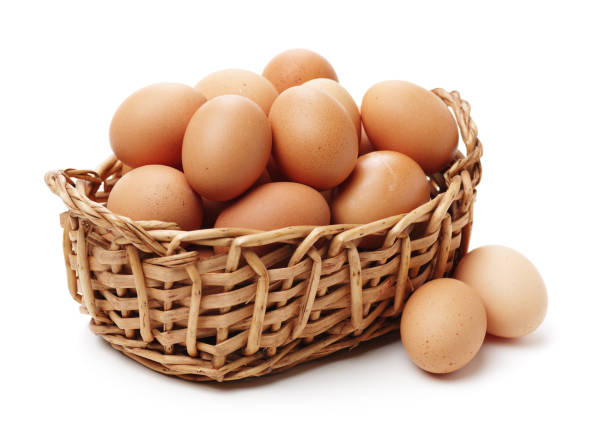 istock Group of brown raw eggs   isolated on white  background 961767828