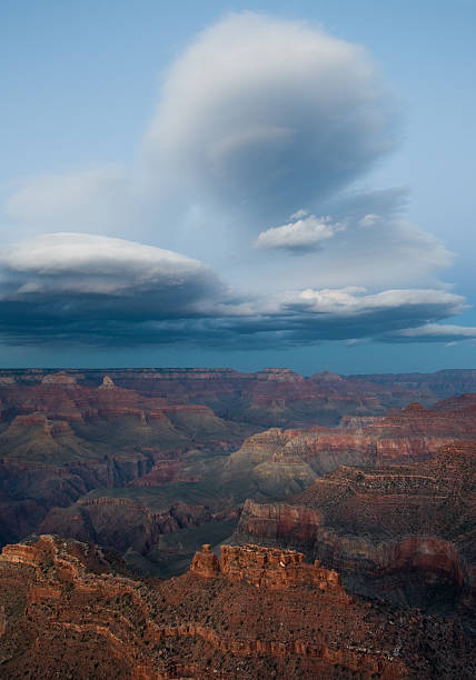 Lenticular clouds over Grand Canyon stock photo