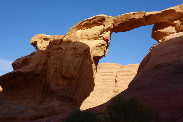 istock Um Fruth rock bridge in desert - Wadi Rum, Jordan, Middle East 961772050
