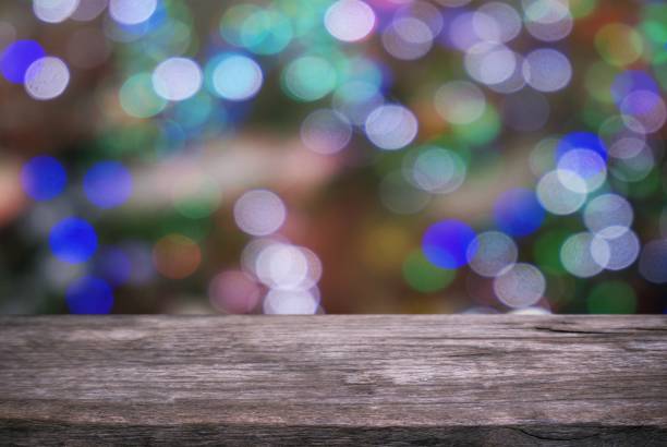 istock Empty wooden table in front of abstract bokeh background . can be used for display or montage your products.Mock up for display of product. for Christmas, new year celebration 961774450