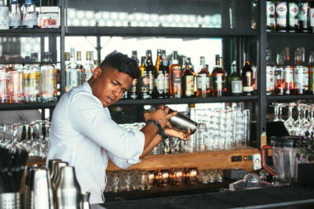 istock Expert barman shakes a cocktail 961775944