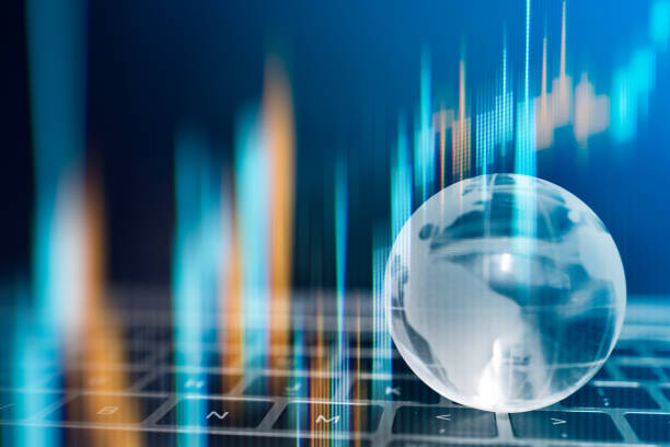 istock World Wide currency trading trend concept, Clear crystal globe with world map with profit graph investor background. business ideas and competition and strategy plan. 961783076