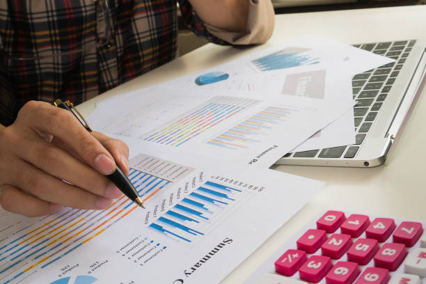 istock Businessman check about cost and doing finance at office. 961783290
