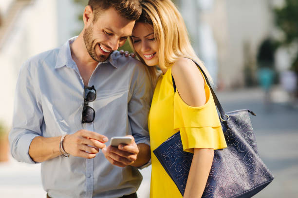istock Couple looking at the cellphone 961784834