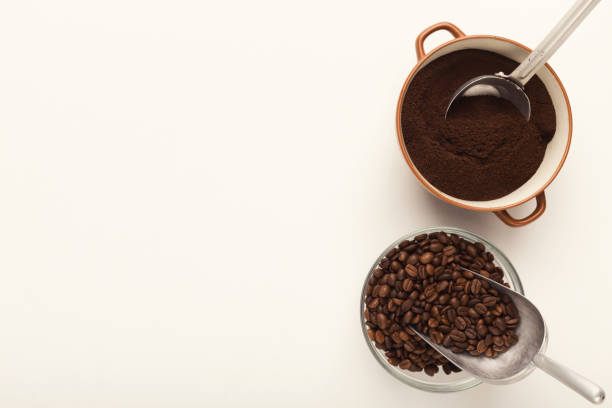 istock Top view on coffee beans and power bowls isolated on white 961787896
