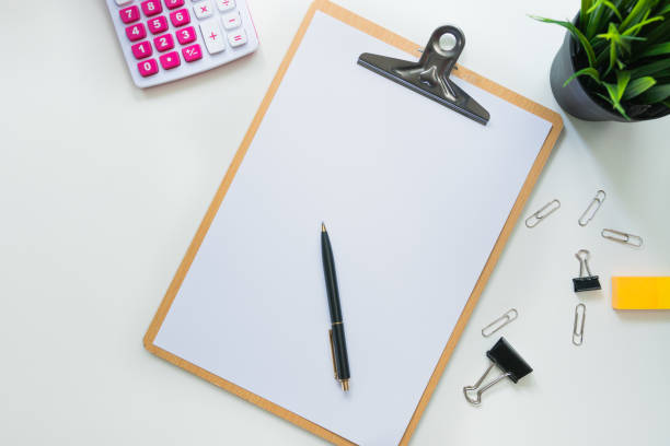 istock Top view of modern work space office desk table with computer , pen and copy space 961788020