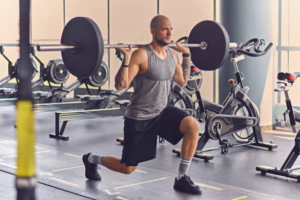 istock A man working out with dumbbells in a gym club. 961788672