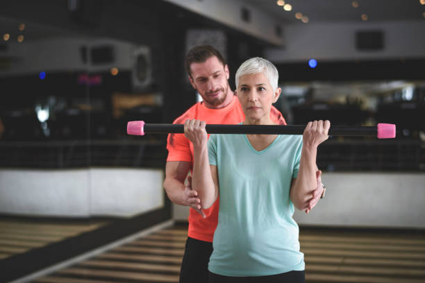 istock Senior woman exercising at the gym 961793396