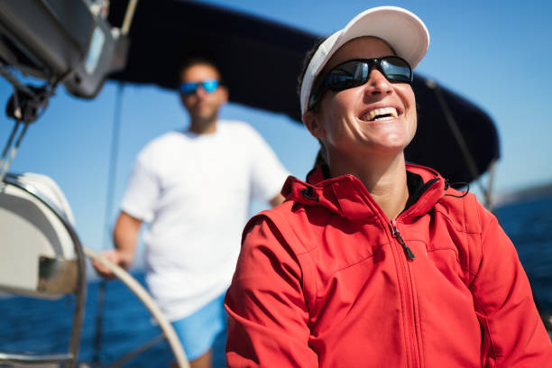 istock Attractive strong woman sailing with her boat 961797184