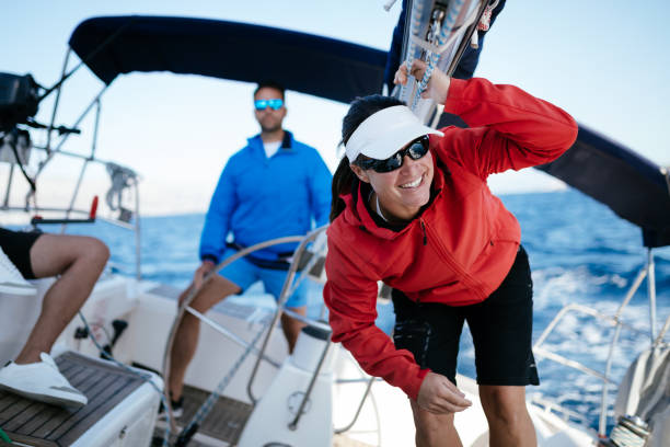 istock Attractive strong woman sailing with her boat 961797468