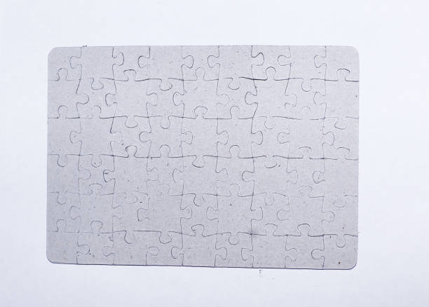 istock close up.blank shield assembled from puzzle pieces on white background 961797752
