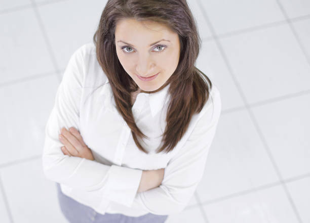 istock view from the top.young business woman looking at camera 961798144