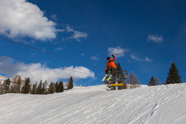 istock Skier in Action: Ski Jumping in the Mountain Snowpark 961800108
