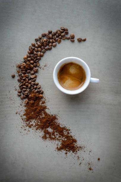 istock Cups of cappuccino and coffee beans 961804810