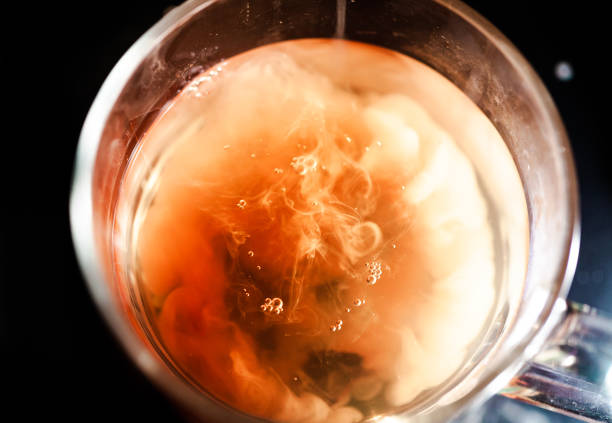 istock A nice warm cup of tea, shot in a studio, milk swirls in tea 961808498