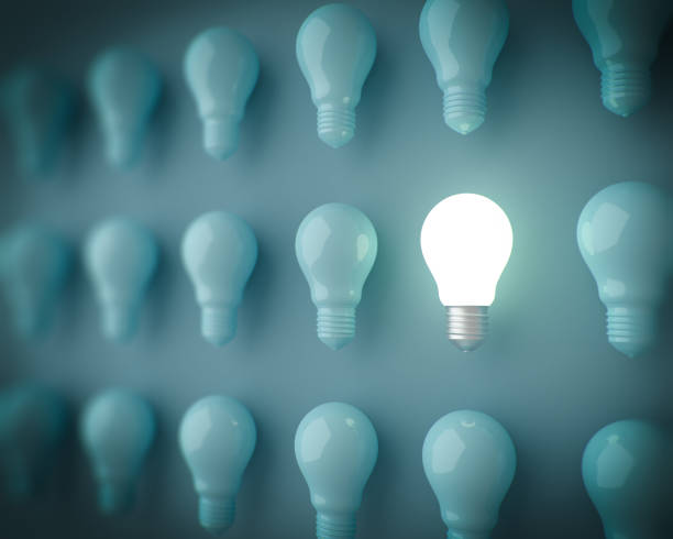 istock bulbs and one of them is glowing. 961808900