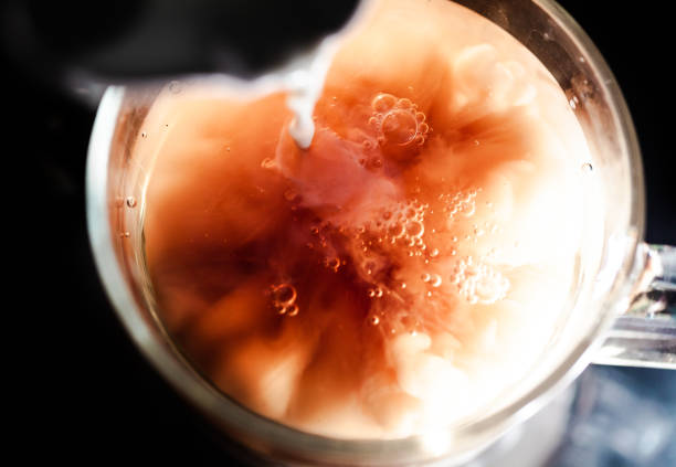 istock A nice warm cup of tea, shot in a studio, milk swirls in tea 961813614