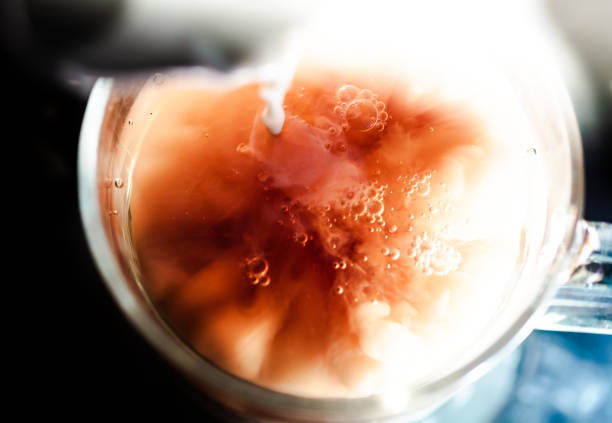 istock A nice warm cup of tea, shot in a studio, milk swirls in tea 961814524