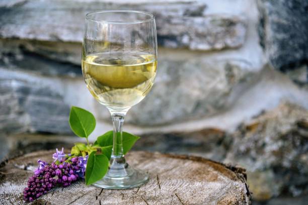 istock White wine and lilacs 961814750