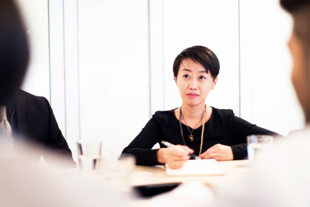 istock Female entrepreneur chairing a board meeting 961826680