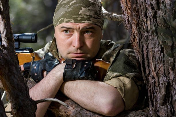 istock young man with an air rifle 961832630