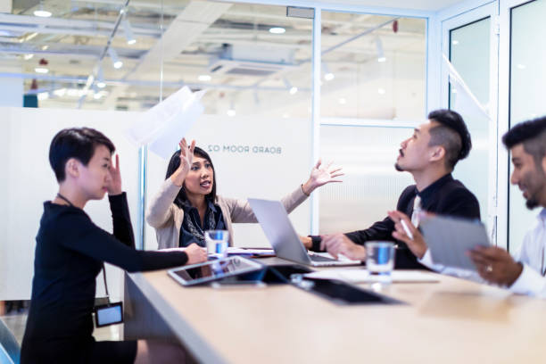 istock Angered female business owner throwing away sales reports 961834148