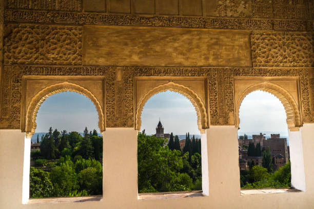 istock Three windows and muslim stucco in the Alhambra of Granada 961837686