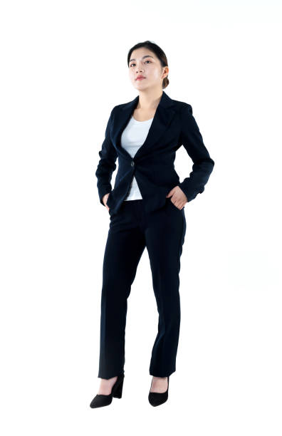 istock Businesswoman standing with hands in pockets 961837768