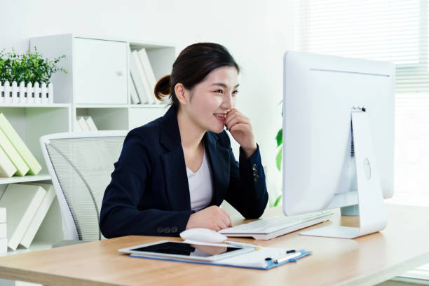 istock Smiling businesswoman working at her office 961838510