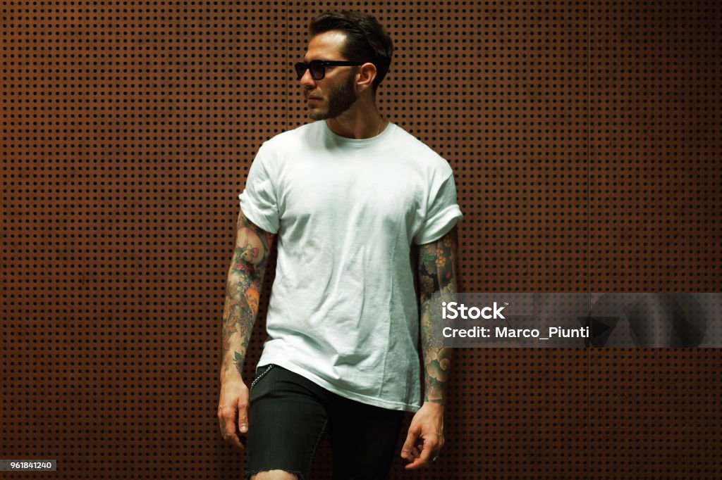 Portrait of tattooed young man Men Stock Photo