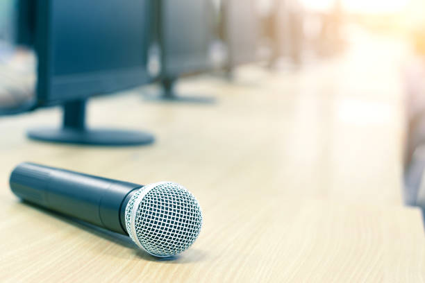 istock Microphone in conference on seminar room event background 961851122