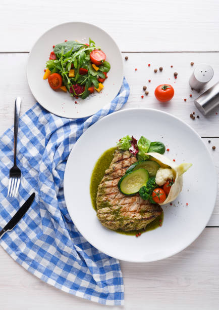istock Appetizing grilled beefsteak and healthy vegetable salad 961852726