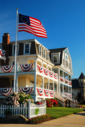 Ocean Grove NJ, USA July 2, 2010 A grand Victrorian home is decorated with the red, white and blue bunting for the Fourth of July in Ocean Grove, New Jersey