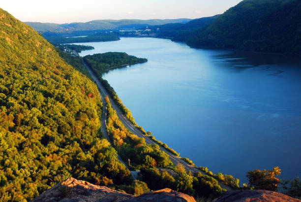 Late Afternoon overlooking the Hudson A view from a cliff trail gives a splendid view of the Hudson River and the Hudson Highlands hudson river photos stock pictures, royalty-free photos & images