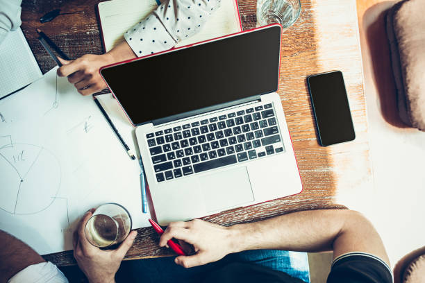 istock The hands of people working and relaxing in pub 961871542
