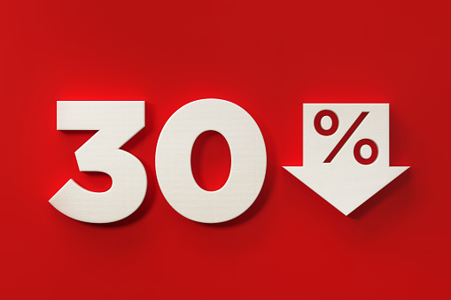 White thirty percent off discount symbol on red background. Horizontal composition with  copy space.