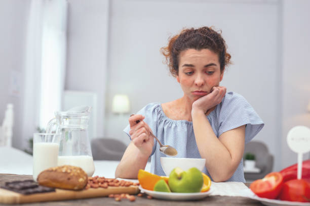 istock Young girl feeling unhappy with food options 961897410