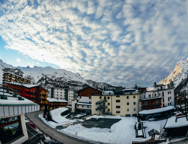 istock beautiful austrian town in snowy mountains 961903390
