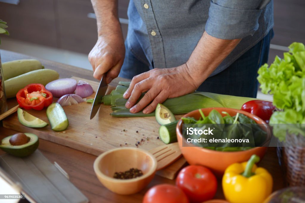 Man Cooking In Kitchen Man Cooking In The Kitchen Stock Photo - Download Image Now - Men ...