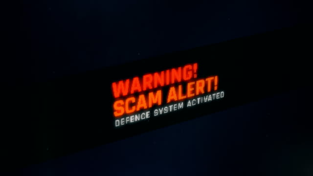 Warning, scam alert, defence system activated, notification on screen