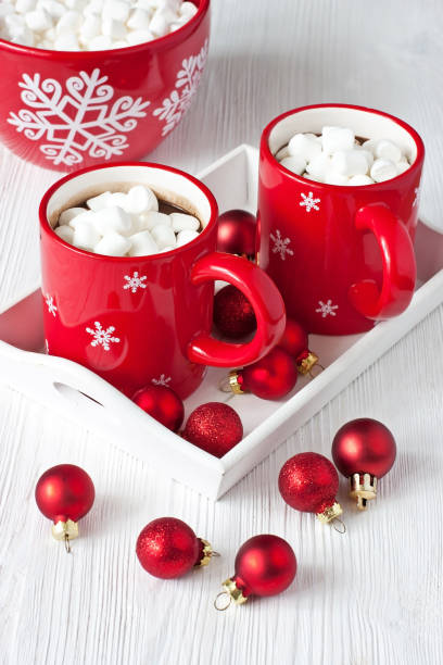 istock Red mugs with hot chocolate and marshmallows 961916686