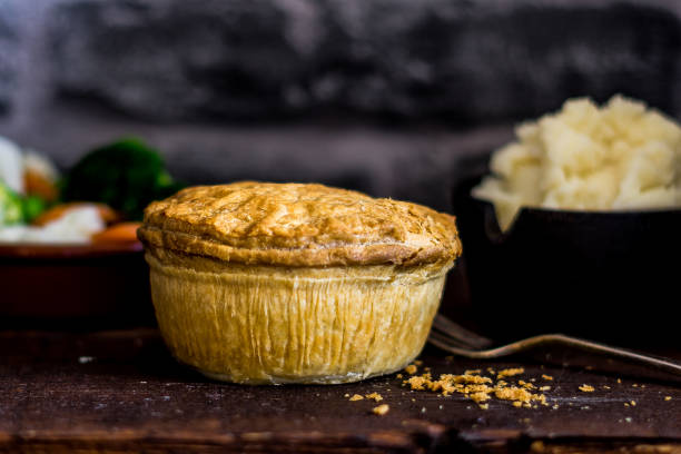 Generic Pie A generic pie with mashed potatoes and vegetables gravy photos stock pictures, royalty-free photos & images