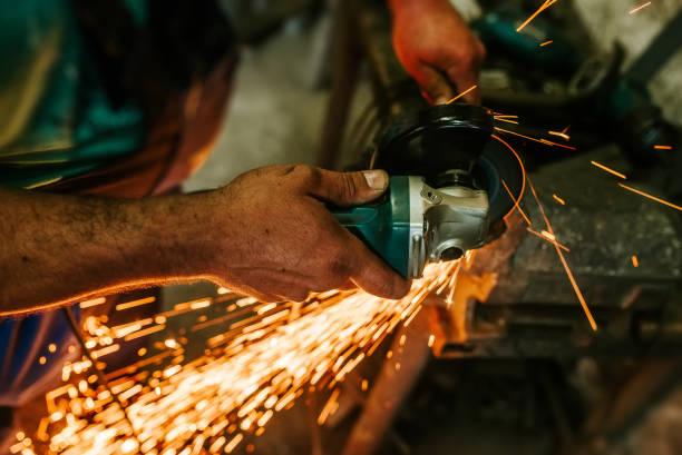 istock Working in the workshop cutting metal. Close-up. 961928644