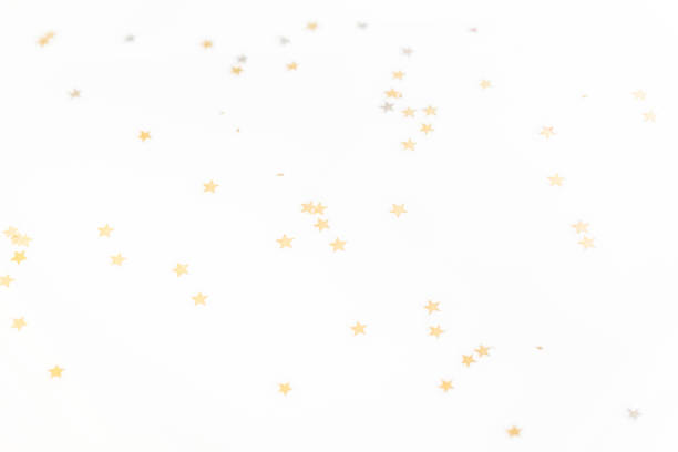 istock christmas golden confetti stars isolated on white background 961931138