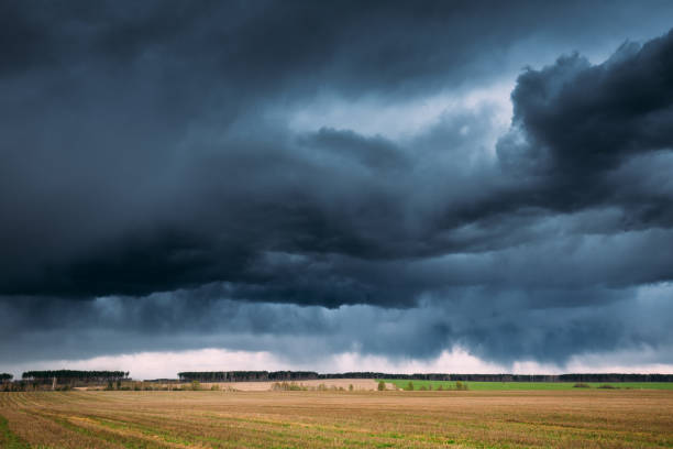 istock Countryside Rural Field Spring Meadow Landscape Under Scenic Dramatic Sky Before Rain. Rain Clouds On Horizon. Agricultural And Weather Concept 961931606