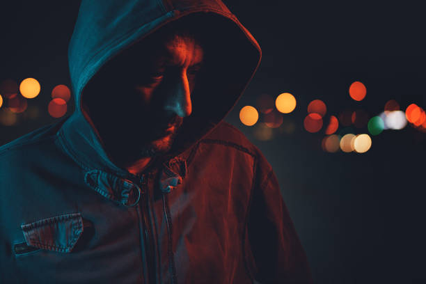 istock Hooligan with hoodie in urban surrounding 961934414