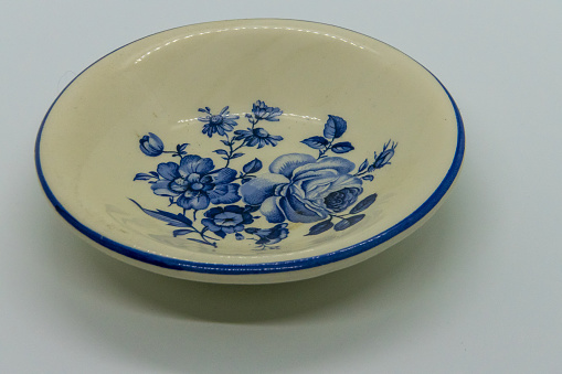 Decorative plate with blue flowers