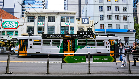 MELBOURNE, AUSTRALIA - MARCH 15, 2018 : Tram in Melbourne city center. Melbourne has the largest urban tramway network in the world. One of tourist attraction.